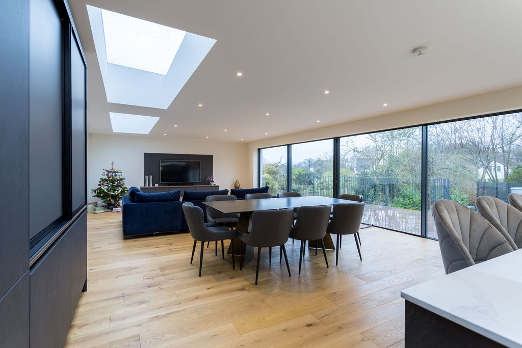 A completed Plan Hub project: a modern open-plan living and dining room with garden views.